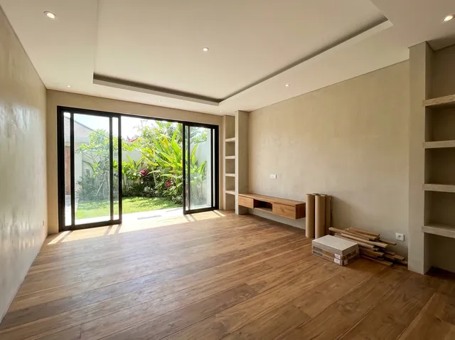 Finished interior of a Bali villa with timber, terrazzo and built-in joinery